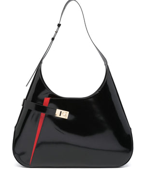 Black handbag with a red stripe and gold clasp on a white background