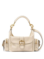 Beige handbag with gold accents on a white background