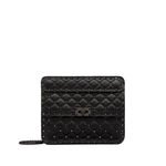Black quilted wallet with chain strap on a light gray background
