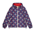 Blue Gucci jacket with red and white pattern on a light gray background