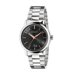 Gucci automatic watch with black face and silver metal strap on a white background