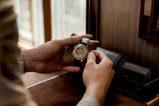 Hands winding automatic watch close-up