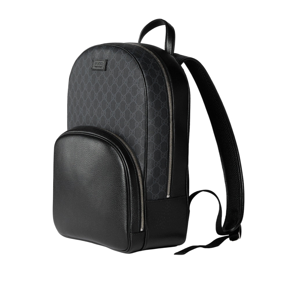 Black and gray patterned backpack on a light gray background