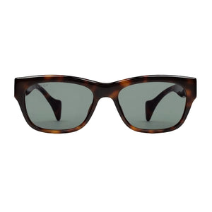 Sunglasses with tortoiseshell frame and dark lenses on a light gray background