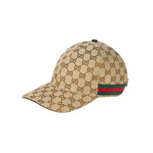 Beige cap with Gucci logo and red and green stripe on a light gray background
