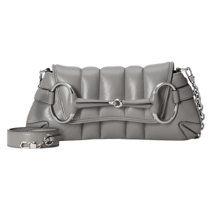 Gray quilted Gucci Horsebit handbag with a chain strap on a light gray background