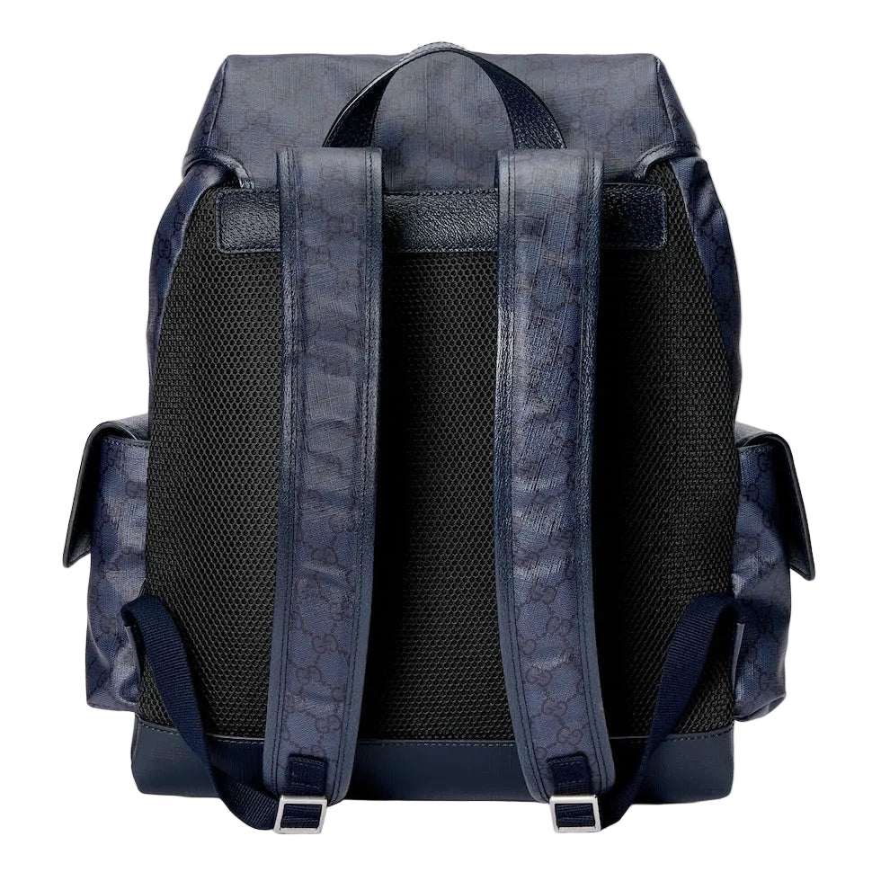 Backpack with patterned blue straps on a light gray background