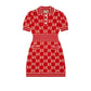 Red dress with Gucci logo pattern on a light gray background