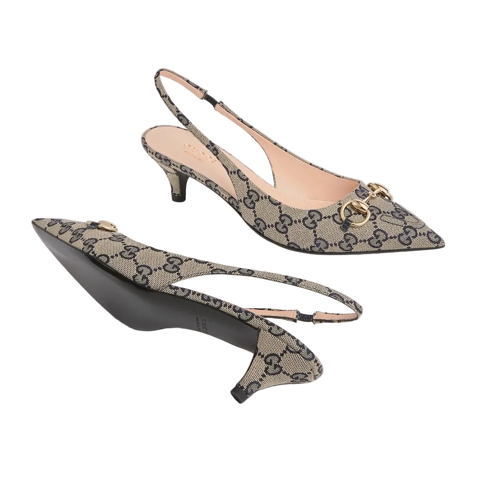 Pair of patterned slingback heels on a light gray background