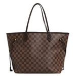 Brown checkered handbag with black handles on a white background