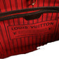 Red Louis Vuitton bag with visible branding on a white background