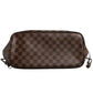 Brown checkered handbag on a white background