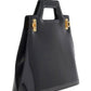 Black handbag with gold hardware on a white background