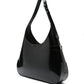 Black shoulder bag on a white background