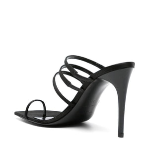 Black high-heeled sandal with multiple straps on a white background