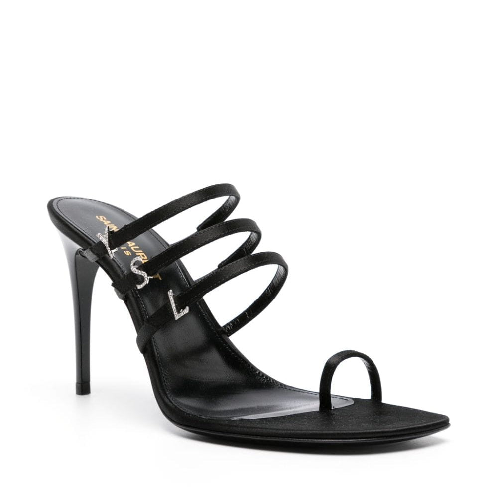 Black high-heeled sandal with multiple straps on a white background
