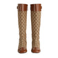 Beige and brown patterned knee-high boots on a white background