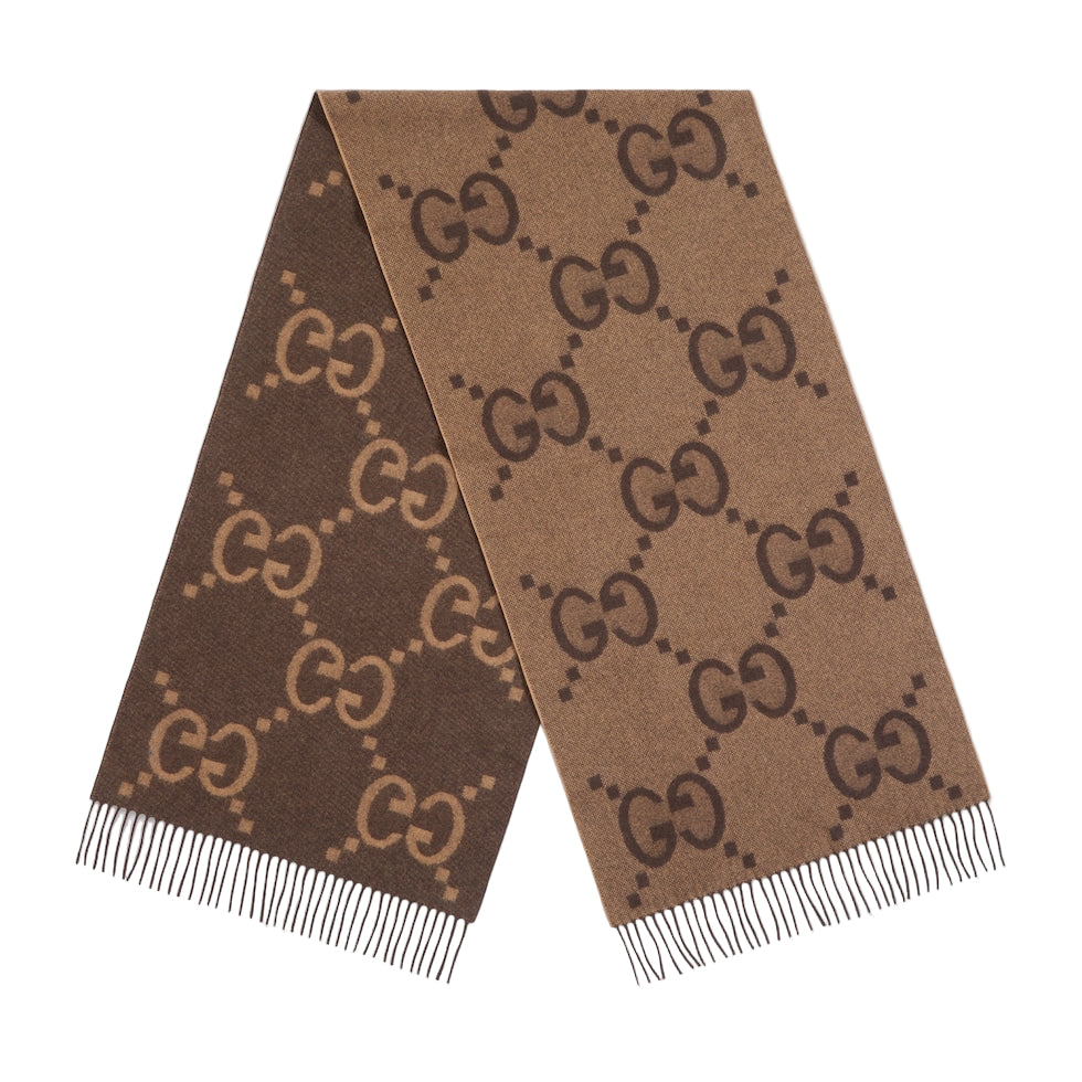 Brown scarf with Gucci logo pattern on a light gray background
