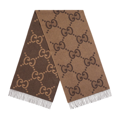 Brown scarf with Gucci logo pattern on a light gray background