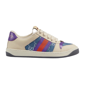 Beige Gucci sneaker with colorful accents on a white background