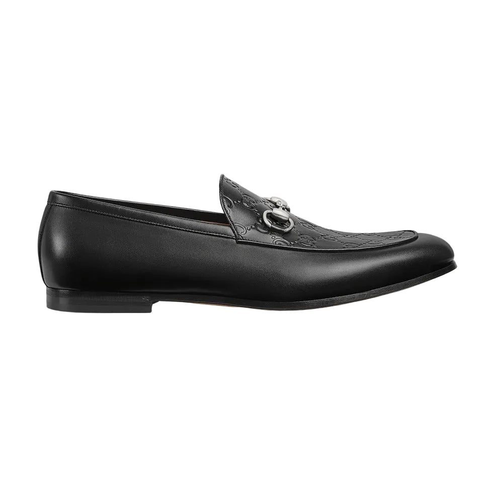 Black loafer shoe on a white background
