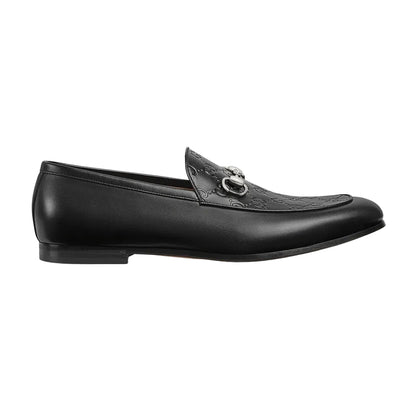 Black loafer shoe on a white background