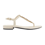 Beige sandal with a brand name on a white background