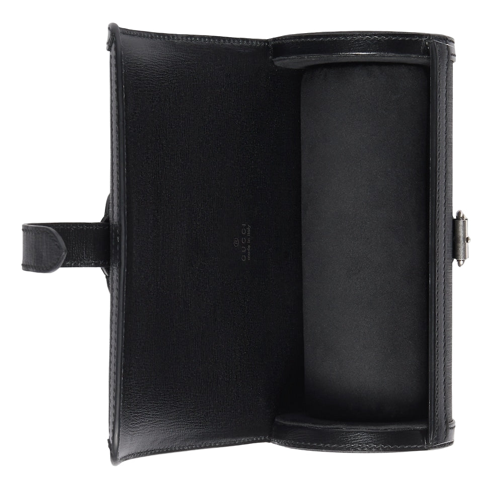 Black leather clutch bag with visible brand logo on a light gray background