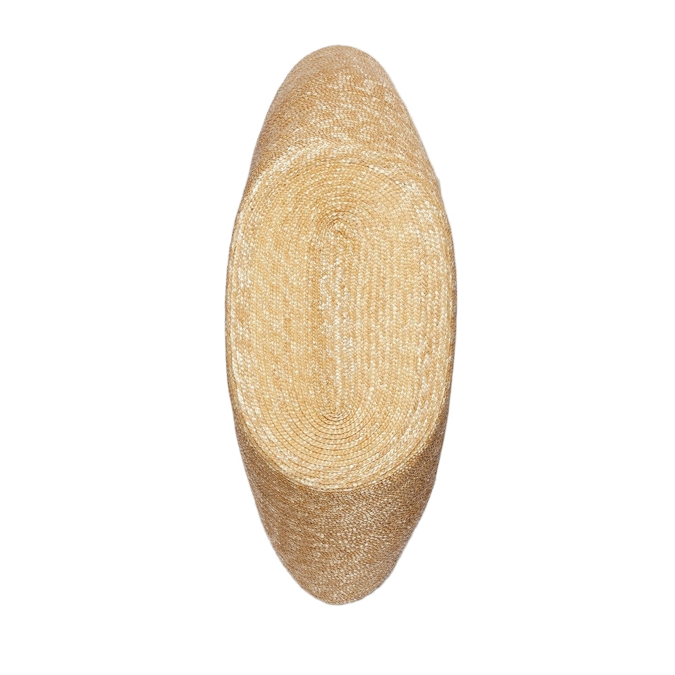 Beige woven cylindrical pillow on a light gray background