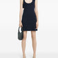Alt Tag: Courreges Pre Courreges Pre Courrèges 90's mini dress modeled in navy scoop-neck mini with side cutout and shoulder bow