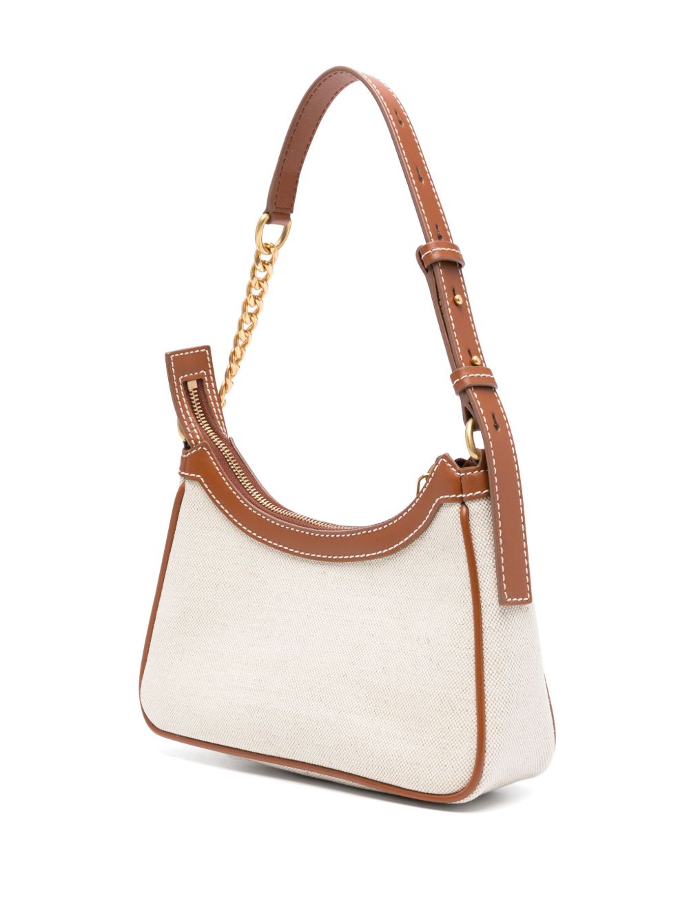 White handbag with brown leather accents on a white background