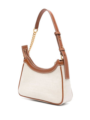 White handbag with brown leather accents on a white background