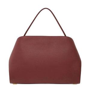 Brown handbag on a white background