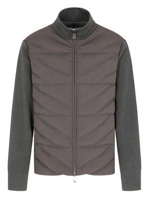 Gray quilted jacket with a plain background
