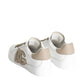 White sneaker with beige accents on a white background
