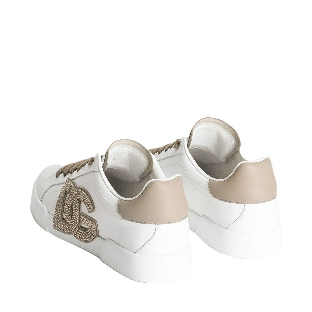 White sneaker with beige accents on a white background