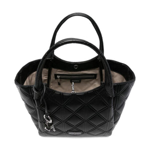 Black quilted handbag on a white background