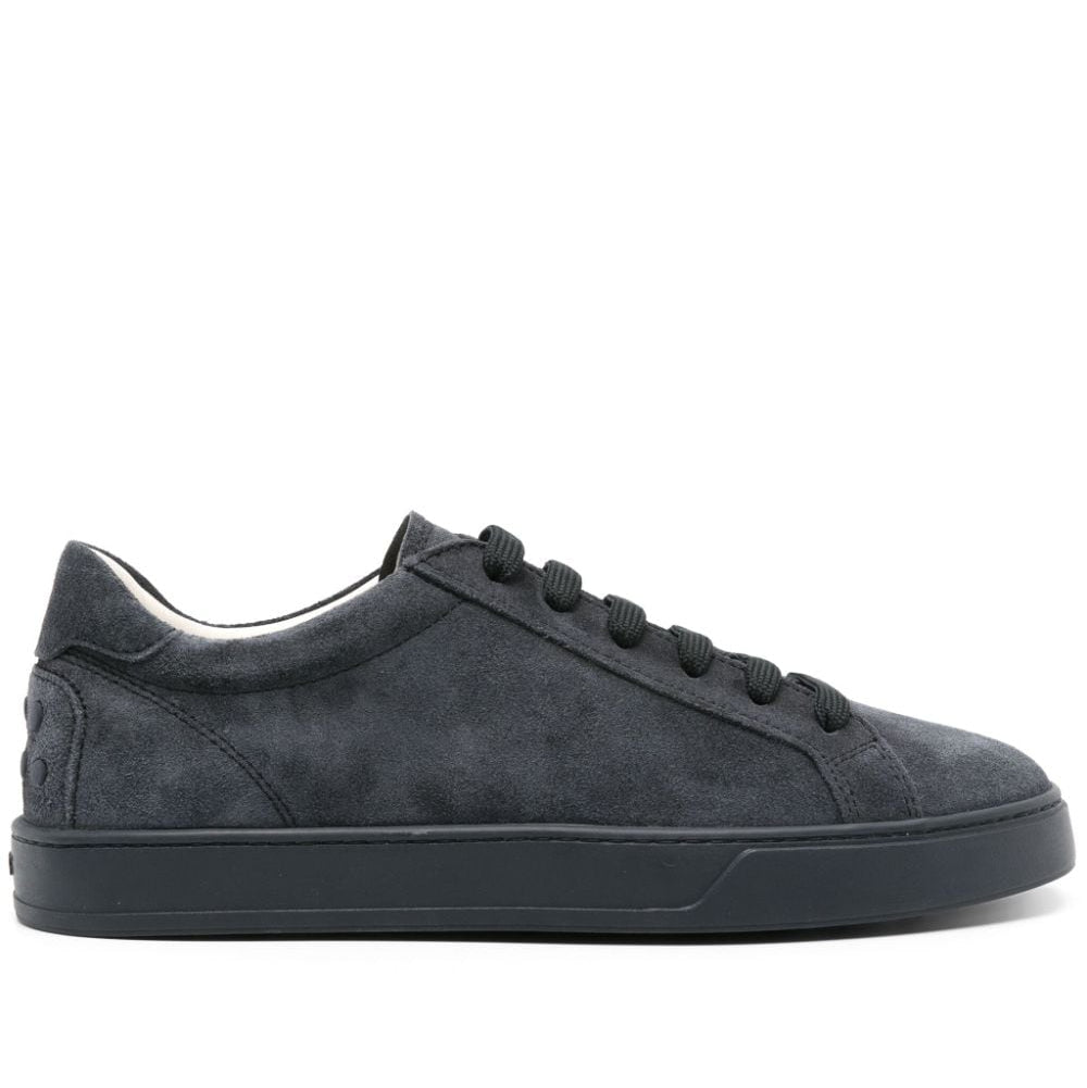 Dark gray suede sneaker on a white background