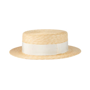Straw Gucci hat with a white band on a white background