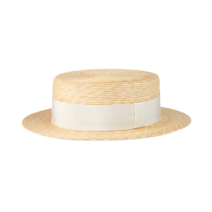 Straw Gucci hat with a white band on a white background