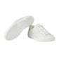 White sneakers on a light gray background