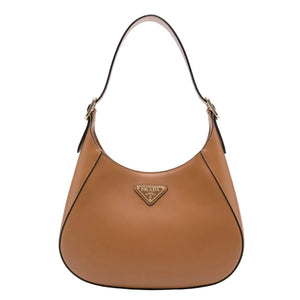 Brown Prada handbag on a white background