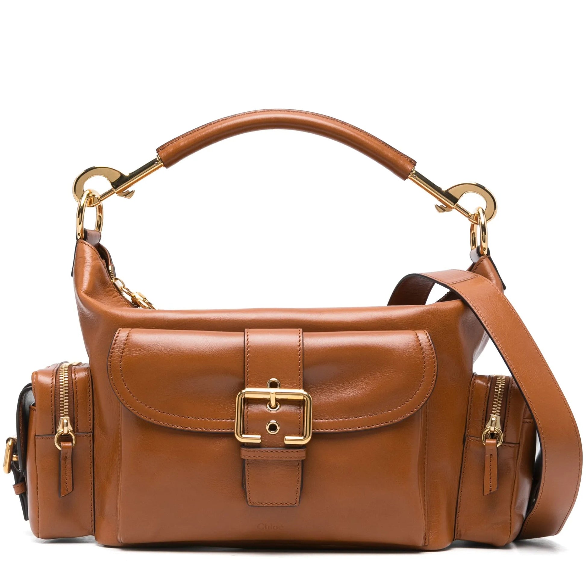 Brown leather handbag with gold accents on a white background