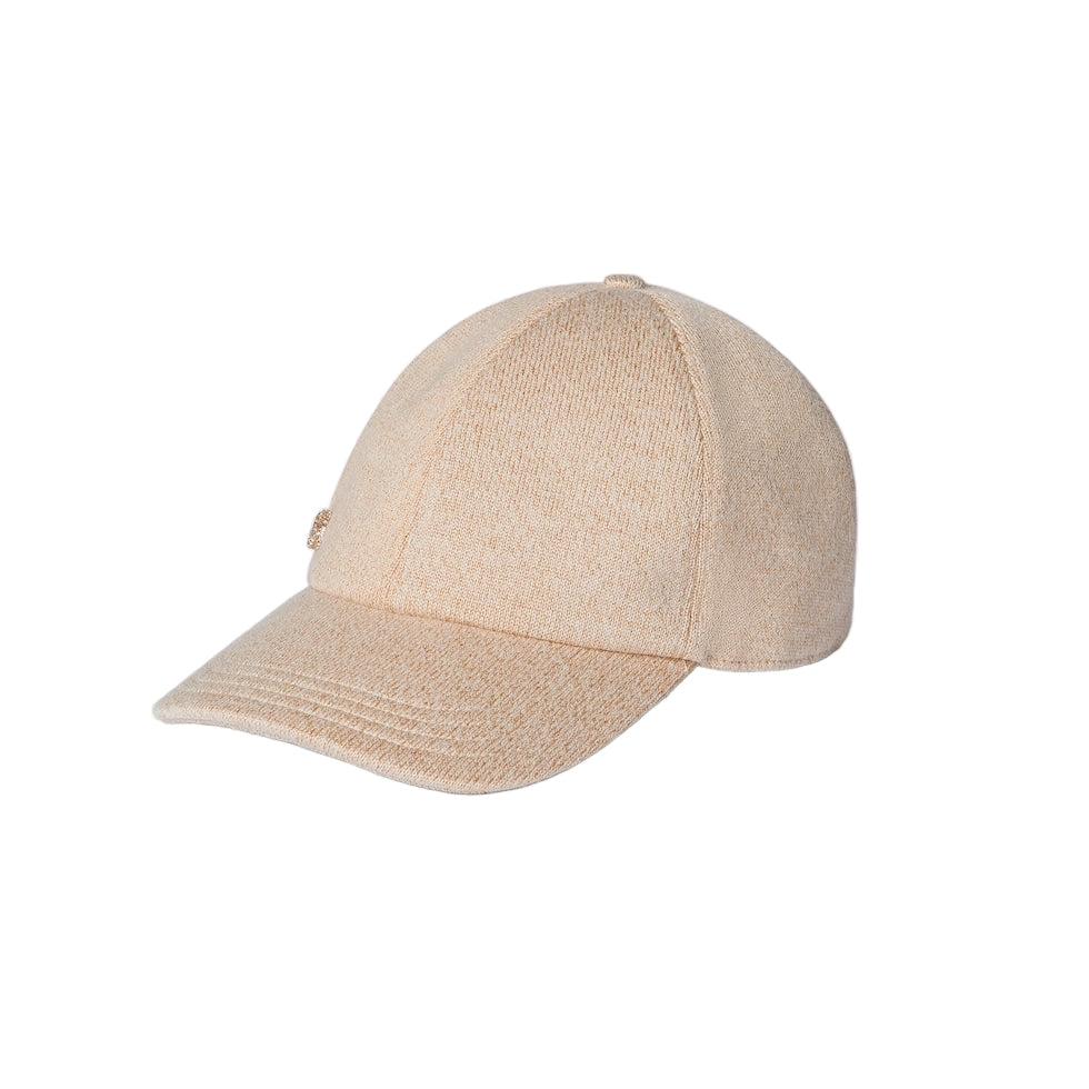 Beige baseball cap on a light gray background