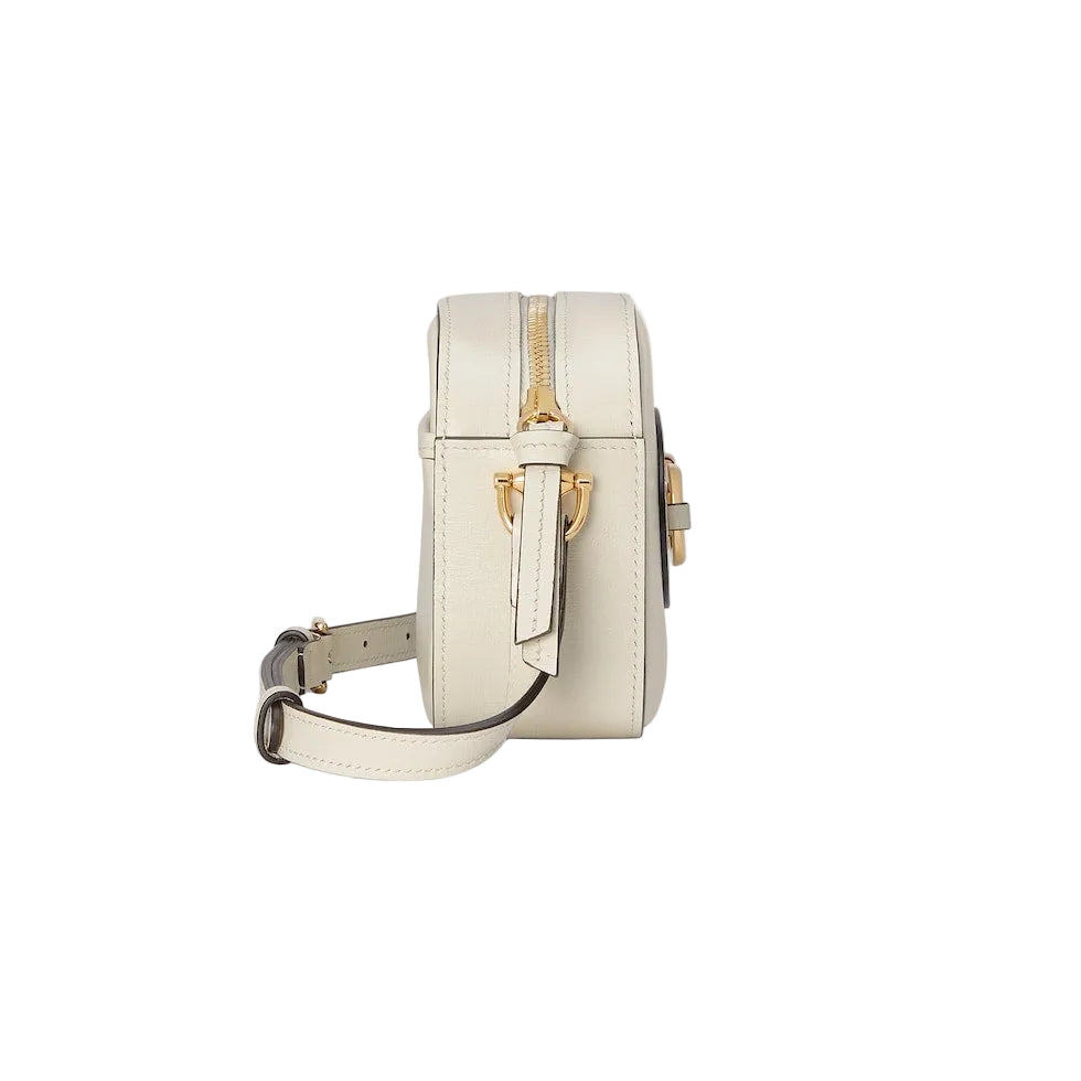 White leather backpack with gold zipper on a light gray background