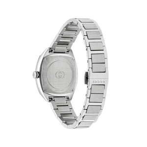 Silver Gucci watch on a light gray background