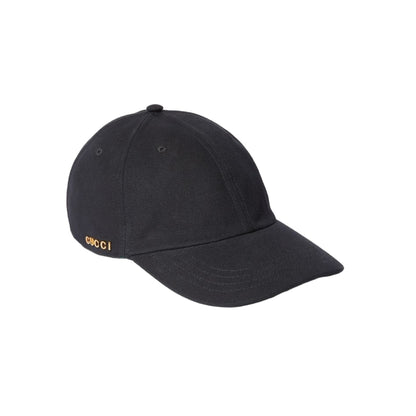 Black Gucci canvas baseball hat on a platform with product details.