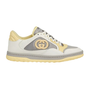 Gucci Sneaker with a distinctive logo on a light gray background