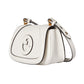 White handbag with gold accents on a light gray background