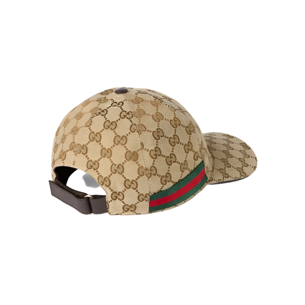 Beige Gucci cap with a green and red stripe on a light gray background